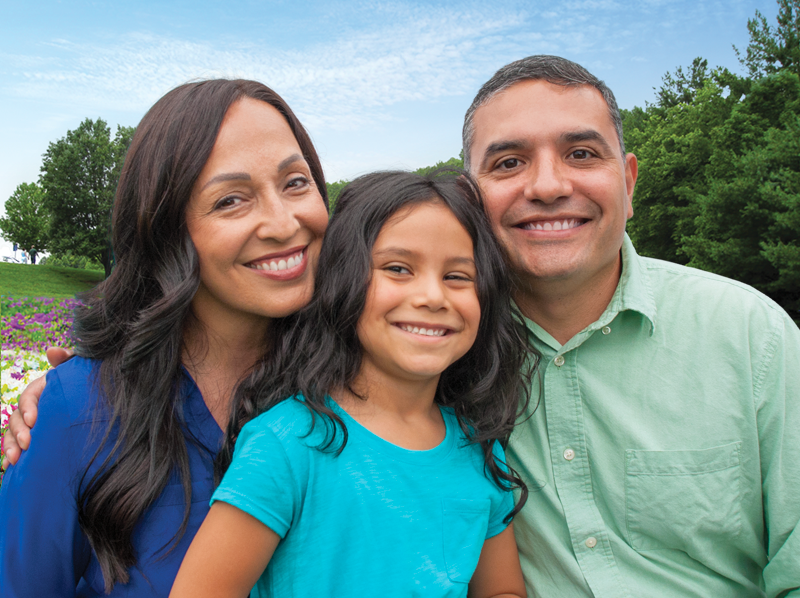 Mother, father and daughter enjoying the outdors.